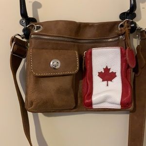 Special edition Roots crossbody purse.